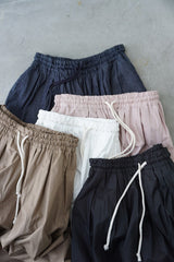 UNIVERSAL TISSU(ユニヴァーサルティシュ)　ナチュラルタイプライター/6ozデニム　コクーンイージーパンツ